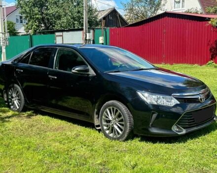 Черный Тойота Камри, объемом двигателя 2.5 л и пробегом 170 тыс. км за 11000 $, фото 1 на Automoto.ua