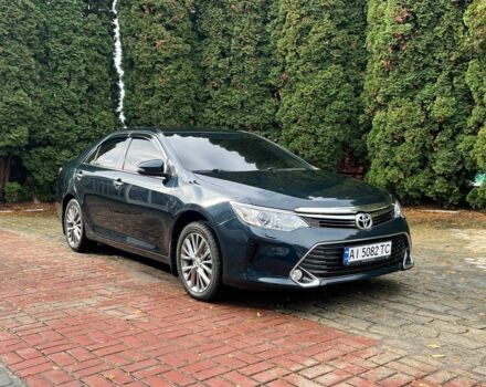 Черный Тойота Камри, объемом двигателя 2.5 л и пробегом 206 тыс. км за 16500 $, фото 1 на Automoto.ua