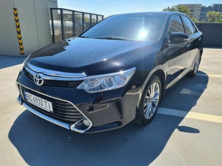 Черный Тойота Камри, объемом двигателя 2.5 л и пробегом 230 тыс. км за 16990 $, фото 1 на Automoto.ua