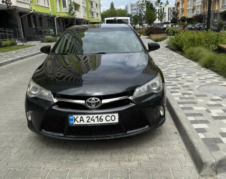 Черный Тойота Камри, объемом двигателя 2.5 л и пробегом 250 тыс. км за 12300 $, фото 1 на Automoto.ua