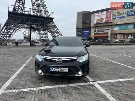 Черный Тойота Камри, объемом двигателя 2.5 л и пробегом 165 тыс. км за 16600 $, фото 1 на Automoto.ua