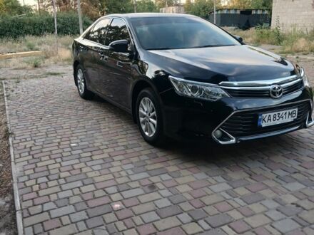 Черный Тойота Камри, объемом двигателя 2.5 л и пробегом 143 тыс. км за 17000 $, фото 1 на Automoto.ua