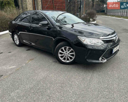 Черный Тойота Камри, объемом двигателя 2.49 л и пробегом 260 тыс. км за 16500 $, фото 1 на Automoto.ua