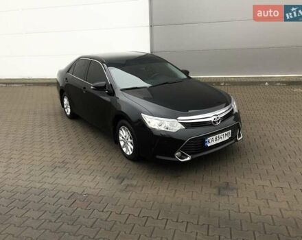 Черный Тойота Камри, объемом двигателя 2.5 л и пробегом 148 тыс. км за 17500 $, фото 1 на Automoto.ua