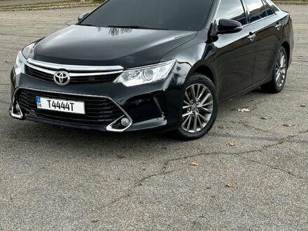 Черный Тойота Камри, объемом двигателя 2.5 л и пробегом 185 тыс. км за 17000 $, фото 1 на Automoto.ua