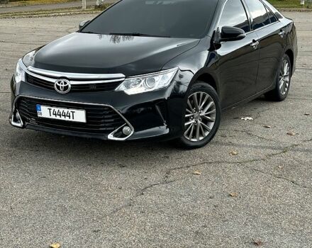 Черный Тойота Камри, объемом двигателя 2.5 л и пробегом 185 тыс. км за 17000 $, фото 1 на Automoto.ua