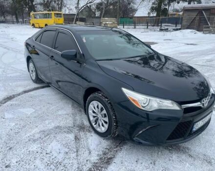 Черный Тойота Камри, объемом двигателя 2.5 л и пробегом 140 тыс. км за 14300 $, фото 1 на Automoto.ua