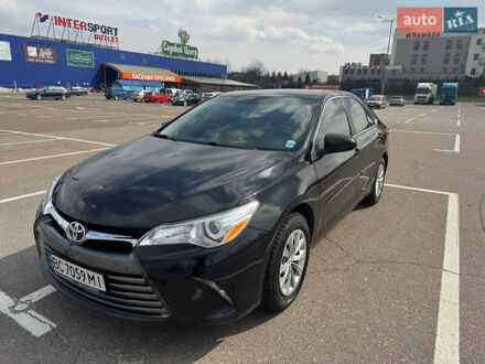 Чорний Тойота Камрі, об'ємом двигуна 2.49 л та пробігом 198 тис. км за 13500 $, фото 1 на Automoto.ua