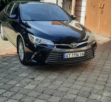 Черный Тойота Камри, объемом двигателя 2.49 л и пробегом 200 тыс. км за 13850 $, фото 1 на Automoto.ua