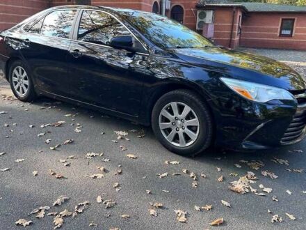 Черный Тойота Камри, объемом двигателя 2.5 л и пробегом 205 тыс. км за 11500 $, фото 1 на Automoto.ua