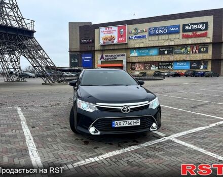 Черный Тойота Камри, объемом двигателя 2.5 л и пробегом 165 тыс. км за 16600 $, фото 1 на Automoto.ua
