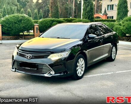 Черный Тойота Камри, объемом двигателя 2.5 л и пробегом 157 тыс. км за 15700 $, фото 1 на Automoto.ua