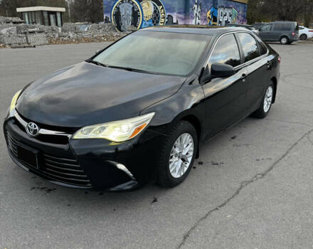 Черный Тойота Камри, объемом двигателя 2.49 л и пробегом 87 тыс. км за 14000 $, фото 1 на Automoto.ua