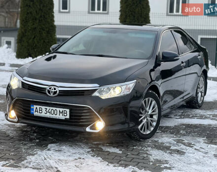 Черный Тойота Камри, объемом двигателя 2.49 л и пробегом 145 тыс. км за 18350 $, фото 1 на Automoto.ua