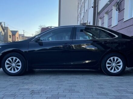 Чорний Тойота Камрі, об'ємом двигуна 2.5 л та пробігом 142 тис. км за 12500 $, фото 1 на Automoto.ua