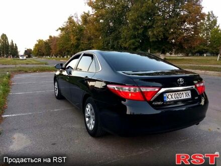 Черный Тойота Камри, объемом двигателя 2.5 л и пробегом 230 тыс. км за 13000 $, фото 1 на Automoto.ua