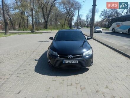 Чорний Тойота Камрі, об'ємом двигуна 2.49 л та пробігом 122 тис. км за 15700 $, фото 1 на Automoto.ua