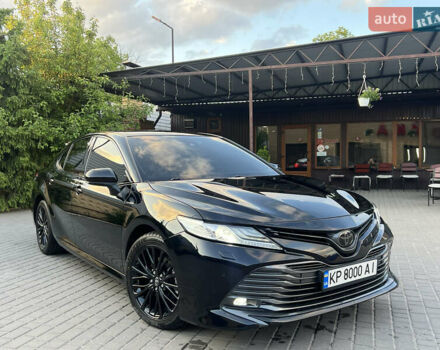 Черный Тойота Камри, объемом двигателя 2.49 л и пробегом 130 тыс. км за 25000 $, фото 1 на Automoto.ua