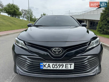Черный Тойота Камри, объемом двигателя 2.5 л и пробегом 247 тыс. км за 16700 $, фото 1 на Automoto.ua