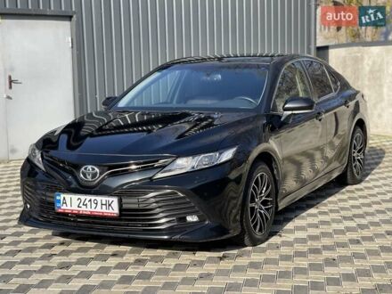 Черный Тойота Камри, объемом двигателя 2.49 л и пробегом 148 тыс. км за 19800 $, фото 1 на Automoto.ua