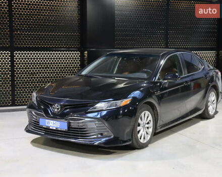 Черный Тойота Камри, объемом двигателя 2.49 л и пробегом 145 тыс. км за 16800 $, фото 1 на Automoto.ua