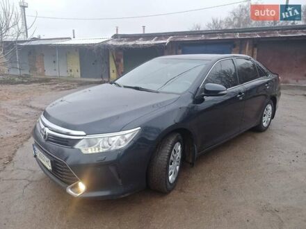Чорний Тойота Камрі, об'ємом двигуна 2.5 л та пробігом 262 тис. км за 15900 $, фото 1 на Automoto.ua