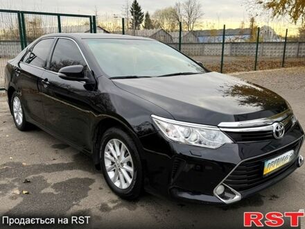 Черный Тойота Камри, объемом двигателя 2.5 л и пробегом 133 тыс. км за 18200 $, фото 1 на Automoto.ua