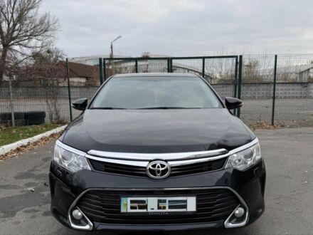 Черный Тойота Камри, объемом двигателя 2.5 л и пробегом 133 тыс. км за 18700 $, фото 1 на Automoto.ua