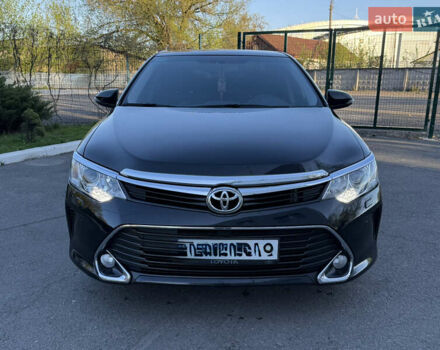 Черный Тойота Камри, объемом двигателя 2.49 л и пробегом 133 тыс. км за 18200 $, фото 1 на Automoto.ua