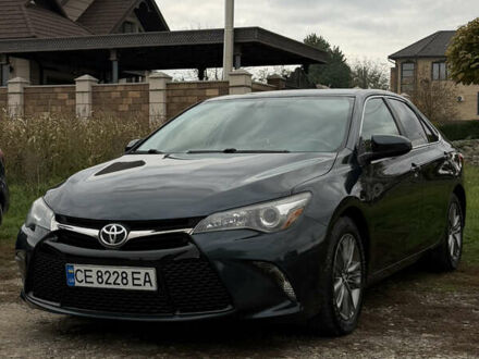 Черный Тойота Камри, объемом двигателя 2.49 л и пробегом 176 тыс. км за 14500 $, фото 1 на Automoto.ua