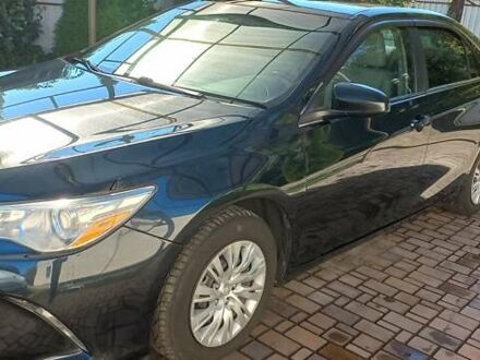 Чорний Тойота Камрі, об'ємом двигуна 2.49 л та пробігом 240 тис. км за 12000 $, фото 1 на Automoto.ua