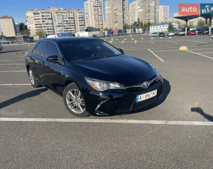Черный Тойота Камри, объемом двигателя 2.4 л и пробегом 190 тыс. км за 10800 $, фото 1 на Automoto.ua