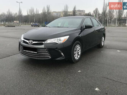 Черный Тойота Камри, объемом двигателя 2.5 л и пробегом 130 тыс. км за 15200 $, фото 1 на Automoto.ua