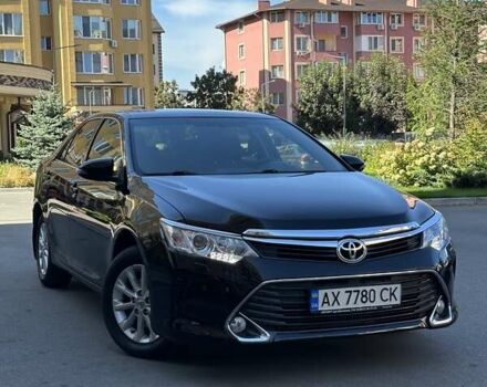 Чорний Тойота Камрі, об'ємом двигуна 2.49 л та пробігом 84 тис. км за 18700 $, фото 1 на Automoto.ua