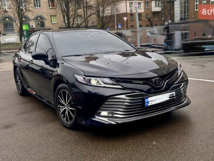 Черный Тойота Камри, объемом двигателя 2.5 л и пробегом 77 тыс. км за 25600 $, фото 1 на Automoto.ua