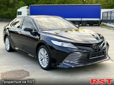Черный Тойота Камри, объемом двигателя 2.5 л и пробегом 199 тыс. км за 22900 $, фото 1 на Automoto.ua