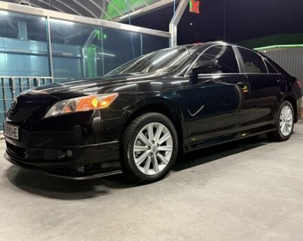 Чорний Тойота Камрі, об'ємом двигуна 2.4 л та пробігом 251 тис. км за 11990 $, фото 1 на Automoto.ua
