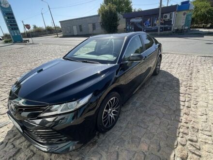 Черный Тойота Камри, объемом двигателя 2.5 л и пробегом 140 тыс. км за 19200 $, фото 1 на Automoto.ua