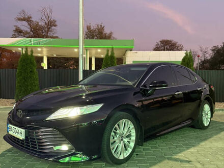 Чорний Тойота Камрі, об'ємом двигуна 2.5 л та пробігом 129 тис. км за 26000 $, фото 1 на Automoto.ua