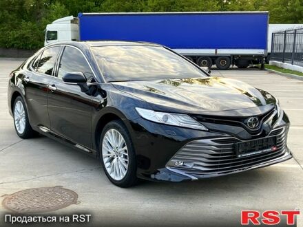 Черный Тойота Камри, объемом двигателя 2.5 л и пробегом 205 тыс. км за 21800 $, фото 1 на Automoto.ua