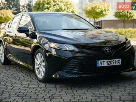Чорний Тойота Камрі, об'ємом двигуна 2.49 л та пробігом 59 тис. км за 17800 $, фото 1 на Automoto.ua