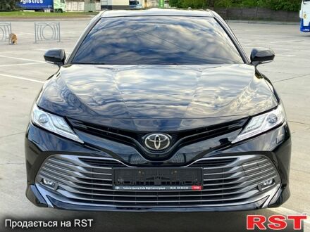 Черный Тойота Камри, объемом двигателя 2.5 л и пробегом 205 тыс. км за 21900 $, фото 1 на Automoto.ua