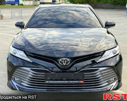 Черный Тойота Камри, объемом двигателя 2.5 л и пробегом 205 тыс. км за 21900 $, фото 1 на Automoto.ua