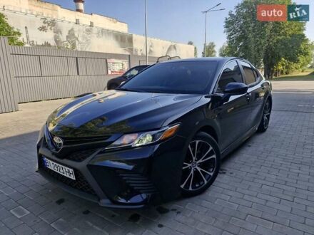 Чорний Тойота Камрі, об'ємом двигуна 2.5 л та пробігом 145 тис. км за 18777 $, фото 1 на Automoto.ua