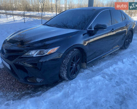 Черный Тойота Камри, объемом двигателя 2.5 л и пробегом 140 тыс. км за 18500 $, фото 1 на Automoto.ua