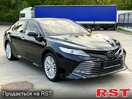 Чорний Тойота Камрі, об'ємом двигуна 2.5 л та пробігом 199 тис. км за 22500 $, фото 1 на Automoto.ua