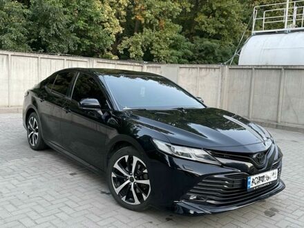 Чорний Тойота Камрі, об'ємом двигуна 2.5 л та пробігом 123 тис. км за 20000 $, фото 1 на Automoto.ua