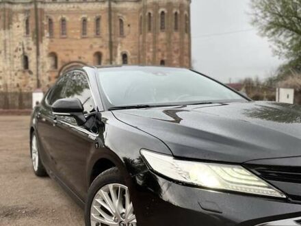 Чорний Тойота Камрі, об'ємом двигуна 2.49 л та пробігом 330 тис. км за 24500 $, фото 1 на Automoto.ua