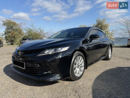 Черный Тойота Камри, объемом двигателя 2.49 л и пробегом 166 тыс. км за 25000 $, фото 1 на Automoto.ua