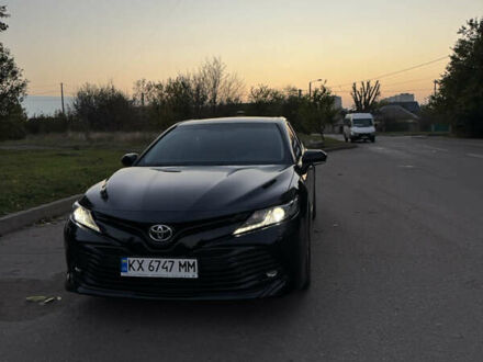 Черный Тойота Камри, объемом двигателя 2.49 л и пробегом 175 тыс. км за 21800 $, фото 1 на Automoto.ua